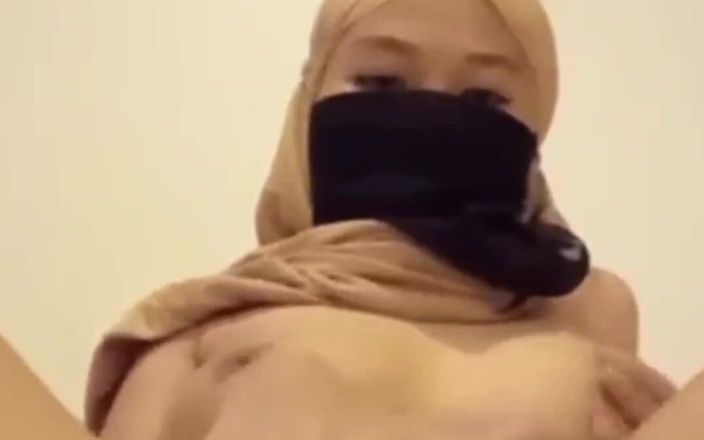 Jilbab69: Horny Hijab Student Plugs Her Vagina