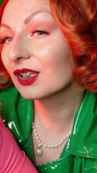 Pretty pin up model Arya and pink latex household gloves