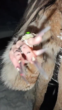 A Gothic Witch Seduces You During a Winter Snowstorm with Her Black Magic Rituals, Long Nails and Fur.