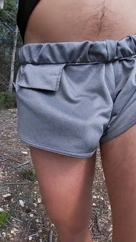 Fit Guy Walks in Short Shorts Without Underwear