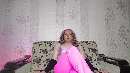 Kitty_Cross: Stunning Femboy Leaning Against Door with Flirty Smile