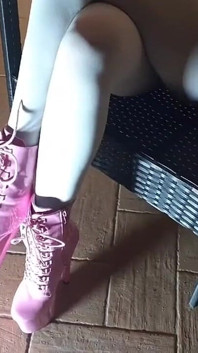 Sitting on a Chair in Pantyhose and High Heeled Boots