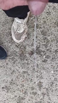 Friend Is Holding My Cock While Im Peeing on the Ground Outdoor
