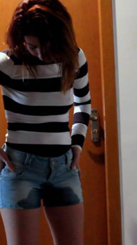 Skinny Redhead Pee in Her Short Jeans
