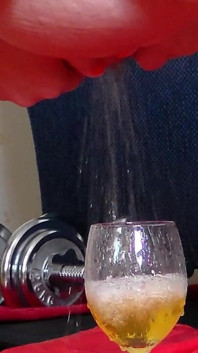 Jen Is Peeing Into a Wineglass