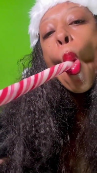 Close-up Candy Cane Lick, Gag and Spit