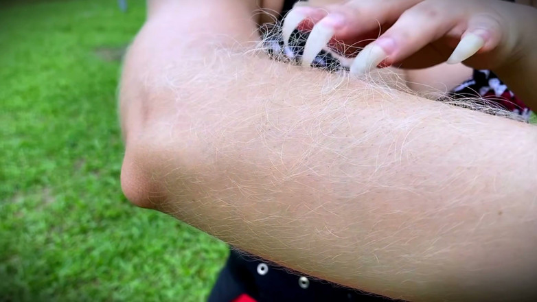 Goddess Li: Applying Mascara to My Arm Hairs in the Park.