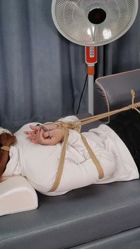 The Extreme Restraints of a Barefoot Girl, Playing with Her Bare Feet