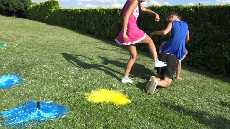 Femdom Austria: Cheerleader kicking fun!