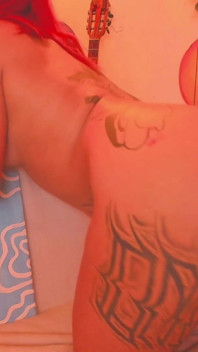 A Latina with a Tattooed Body Is Shaking Her Butt for You