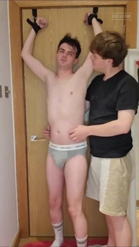 Tied to the Door and Tickled Until I Wet Myself