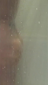 Watch Julie in the Shower Getting Ready for Client