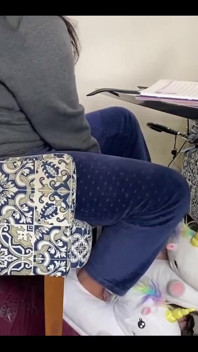 Kiffa Uses Slave as Footstool as She Uses Her Notebook