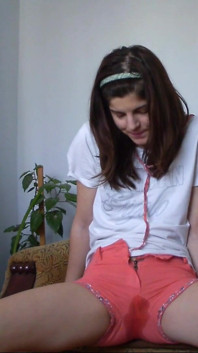 Sexy Teen Has Full Bladder and She Is Desperate to Pee so She Empty Her Bladder in Her Short Pants