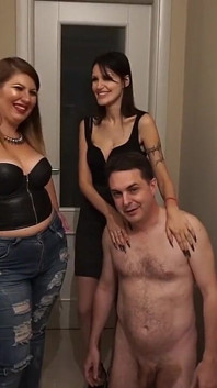 Two Hot Babes Dominate Naked Guy Kneeling in Submission