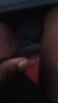 Masturbating