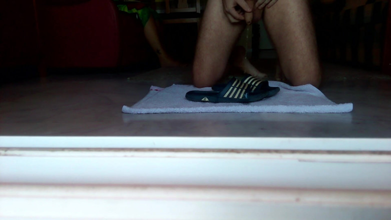 Sex hub male: John is peeing on the bathing slippers on the floor
