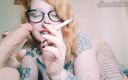 EstrellaSteam: Curvy Girl Smokes a Cigarette and Blows the Smoke on...