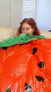 BBW Nurse Vicki Blowing up a Huge Plastic Float That Looks Like a Water Melon Slice