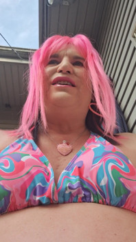 Sitting Outside Sunbathing and Teasing Men!