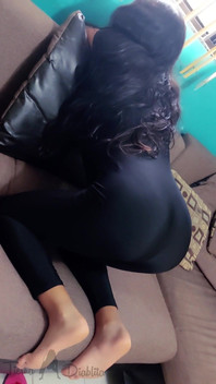 Housewife with Bare Feet and Tight Yoga Pants Is Waiting for You to Fulfill Your Desires