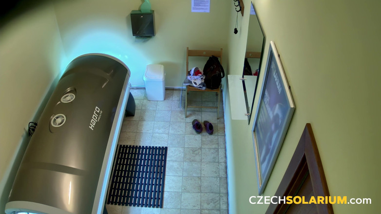 Czech Solarium: Czech Solarium 92: Brunette Enjoys Her Solarium Session, Flashes Her Pussy
