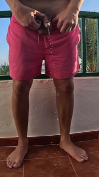 Peeing on the Balcony on Holiday