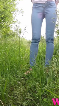 Skinny Brunette with Full Bladder Has to Pee in the Forest and Wet the Tall Grass Touching Her Wet Pussy