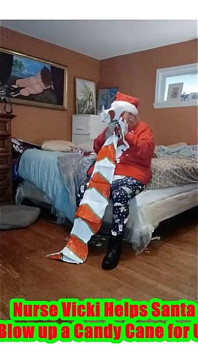 Nurse Vicki Blows up Huge Candy Cany for Santa!
