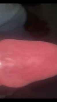 Masturbating