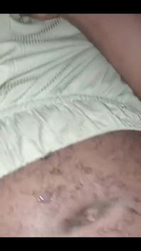 Masturbating