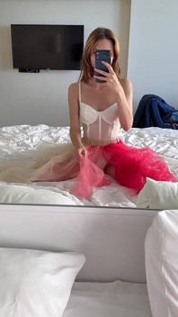 Dancing in My Sheer White Corset and Red Skirt