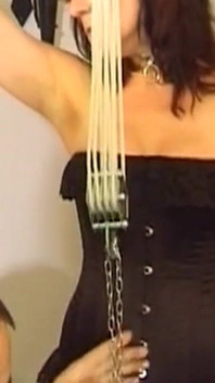 Mature Brunette Submits to Bondage with Two Men
