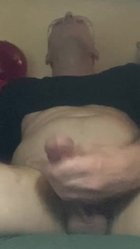 Masturbating