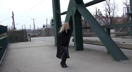 Femdom Austria: Pissing on the bridge