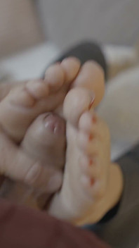 Blonde MILF Gives Sloppy Footjob to Titus in Fuzzy Socks