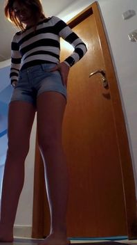 Skinny Redhead Pee in Her Short Jeans