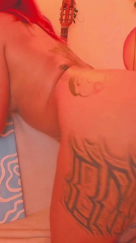 A Latina with a Tattooed Body Is Shaking Her Butt for You