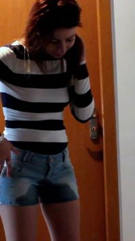 Skinny Redhead Pee in Her Short Jeans