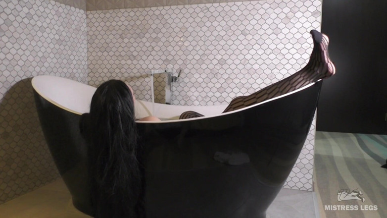 Mistress Legs: Mistress legs in black fishnets in bath tease and ignore