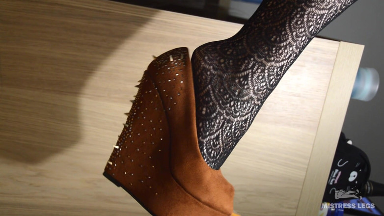 Mistress Legs: My lazy dangling shoe on the feet in black fishnets