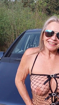 Granny Plays with Her Tits!