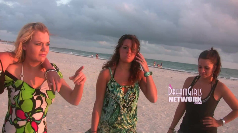 Dream Girls: Vacationers flash on a common beach