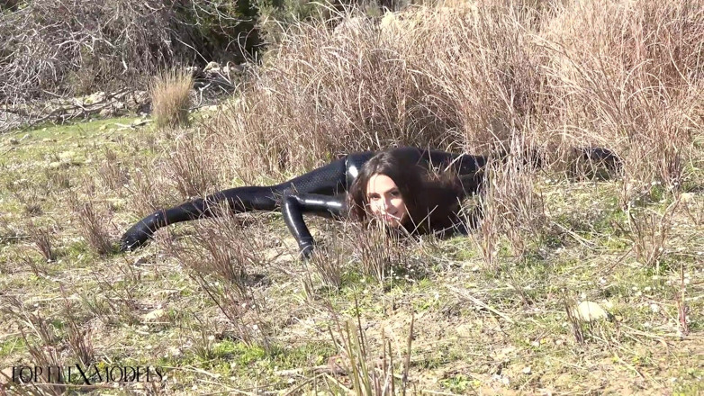 Flexilady: Flexible in a Black Catsuit