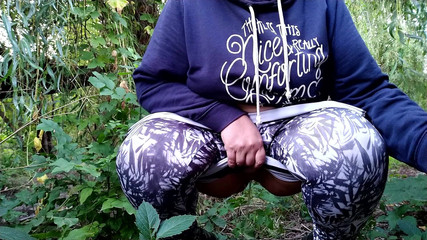 Thumbnail of Lush MILF golden shower solo in nature