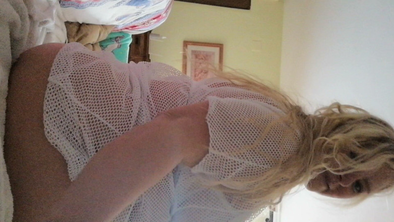 Kitty Queen: Kitty Queen Teasing and Flashing Her Ample Assets and Using...