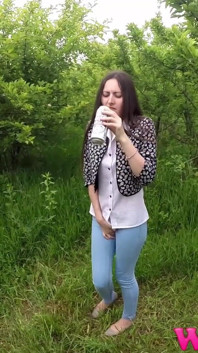 Skinny Brunette with Full Bladder Has to Pee in the Forest and Wet the Tall Grass Touching Her Wet Pussy