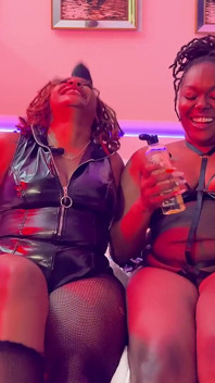 Behind the Scenes: Temptress Mango and Golden Goddess Prepare for a Sultry Fetish Video Shoot