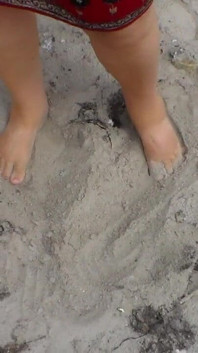 Jen Shows up Her Naked Feet in the Sand