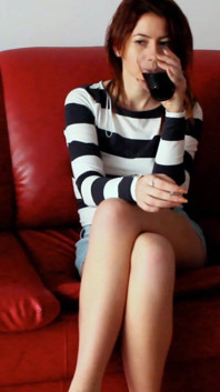 Skinny Redhead Smoking on a Couch
